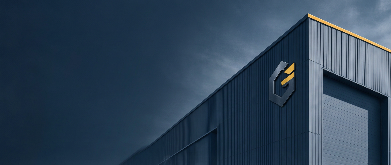 Industrial distribution warehouse with loaded pallet racking at dusk